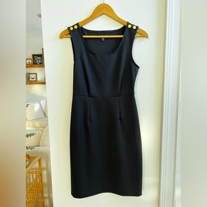 Gap black dress with gold buttons. Sized 4. Good condition.